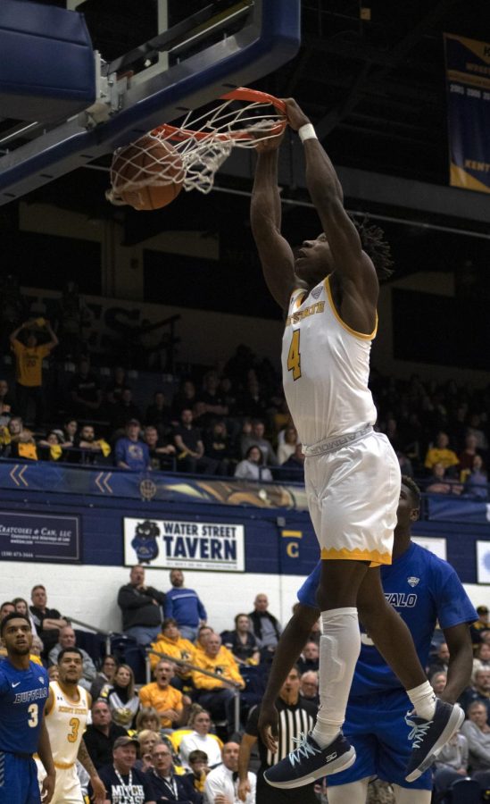 Senior guard Antonio “Booman” Williams [4] dunks the basketball during the men’s basketball game on Feb. 21, 2020. Williams scored a career-high 34 points, but Kent State lost in double overtime to Buffalo 104-98.