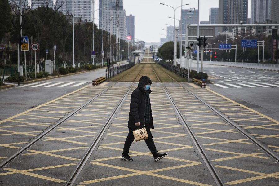 WUHAN, CHINA - FEBRUARY 07: A resident walks across an empty track on February 7, 2020 in Wuhan, Hubei province, China. The number of those who have died from the Wuhan coronavirus, known as 2019-nCoV, in China climbed to 636. (Photo by Getty Images)