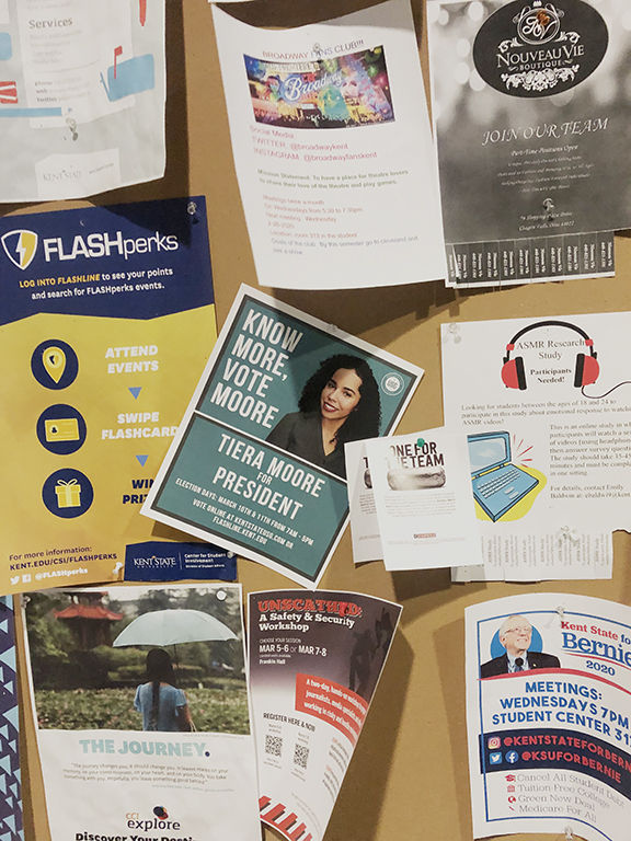 The campaign flyer for Tiera Moore, who is running for Kent States Student Body President position, adorns a bulletin board in Franklin Hall.