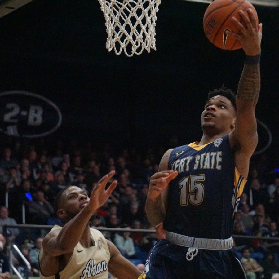 Kent State sophomore Anthony Roberts [15] drives to the basket for a layup against Akron at James A. Rhodes Arena on Friday, Mar. 6, 2020. Kent State lost 79-76.
