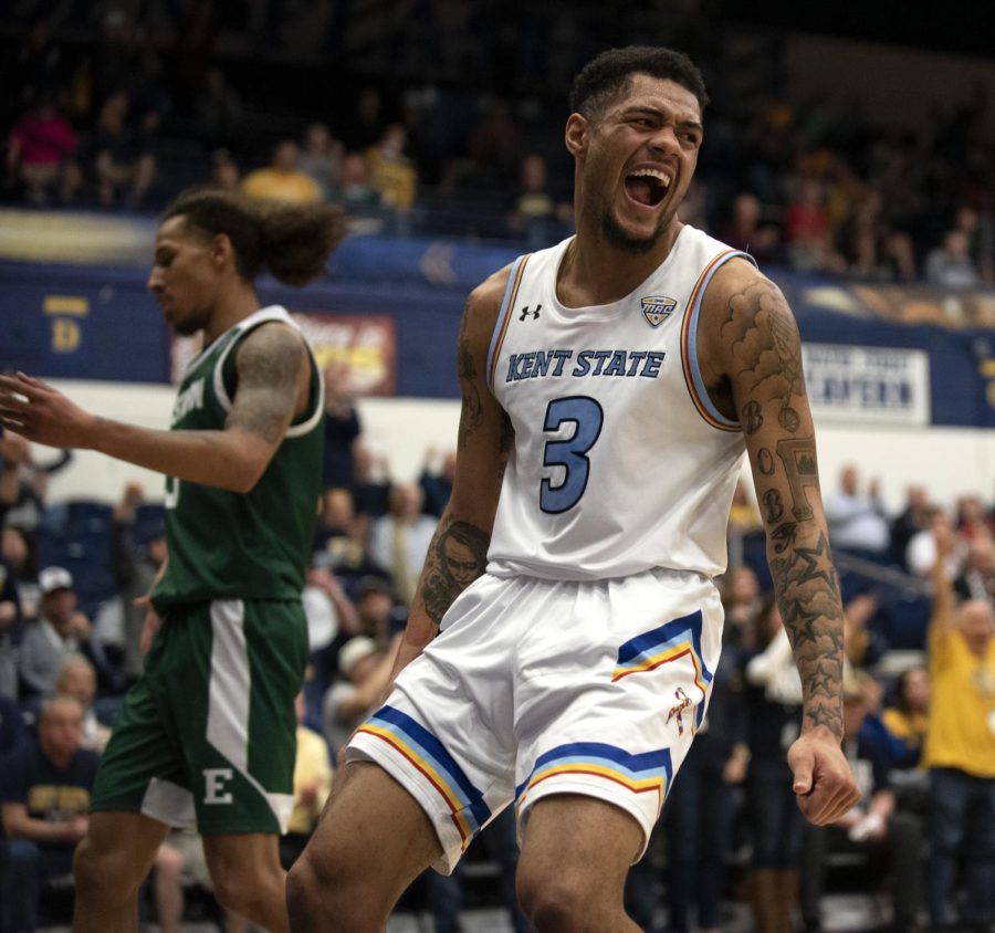Senior Troy Simons (3) celebrates after scoring during the second half against Eastern Michigan on Mar. 9, 2020. Kent State won 86-76 allowing them to move on to the Quarterfinals.