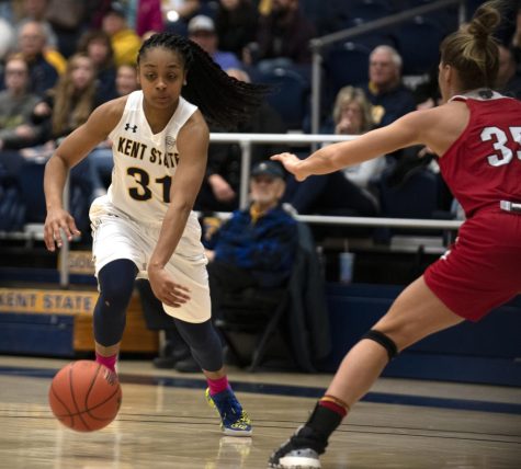 Senior Megan Carter (31) runs down court during the first half of game against Miami University on Sat. Feb. 22, 2020. She had the highest scoring points of 21, with 10 rebounds. Kent State University won 80-75 against Miami University.