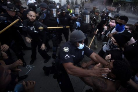 Anger boiled over in more than 30 cities Friday, May 29, with some protesters smashing windows, setting vehicles ablaze and clashing with police.