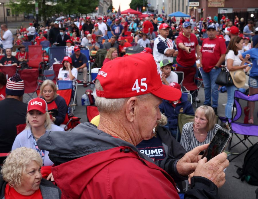 Supporters of U.S. President Donald Trump gather to attend his campaign rally later at the BOK Center, June 20, 2020 in Tulsa, Oklahoma. Trump is scheduled to hold his first political rally since the start of the coronavirus pandemic at the BOK Center on Saturday while infection rates in the state of Oklahoma continue to rise.