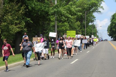 Protesters march towards The Church in Silver Lake. Stow police blocked traffic for demonstrators to occupy part of Kent road. 