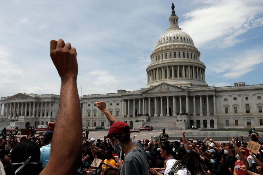 Demonstrators protest the death of George Floyd as they gather Wednesday, June 3, 2020, on the East side of the U.S. Capitol in Washington.