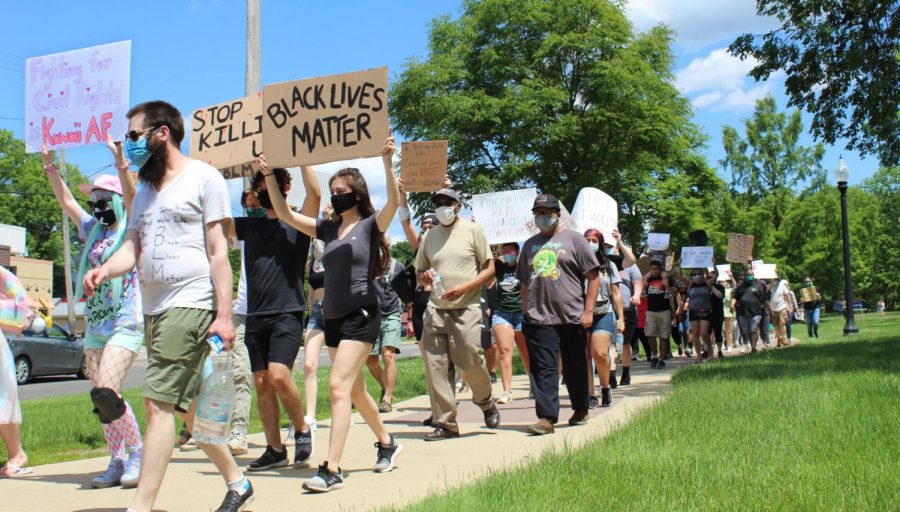 Protesters make their way towards the Kent Police Department. The march started at 2:30 p.m.