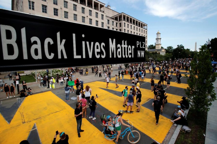 A+street+sign+of+Black+Lives+Matter+Plaza+is+seen+near+St.+Johns+Episcopal+Church%2C+as+the+protests+against+the+death+of+George+Floyd+while+in+Minneapolis+police+custody+continue.