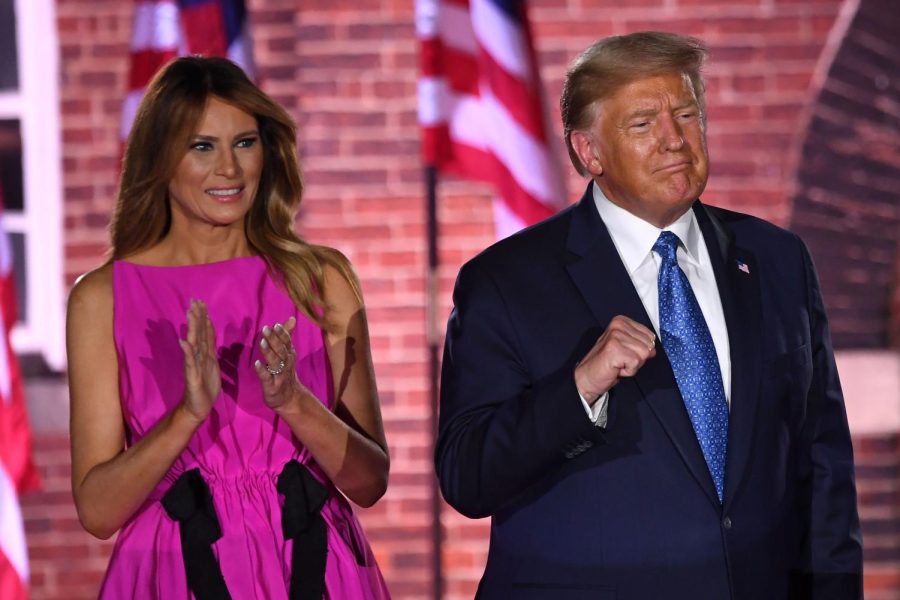 First+Lady+Melania+Trump+and+President+Donald+Trump+gesture+to+attendees+during+the+third+night+of+the+Republican+National+Convention+at+Fort+McHenry+National+Monument+in+Baltimore%2C+Maryland%2C+August+26%2C+2020.