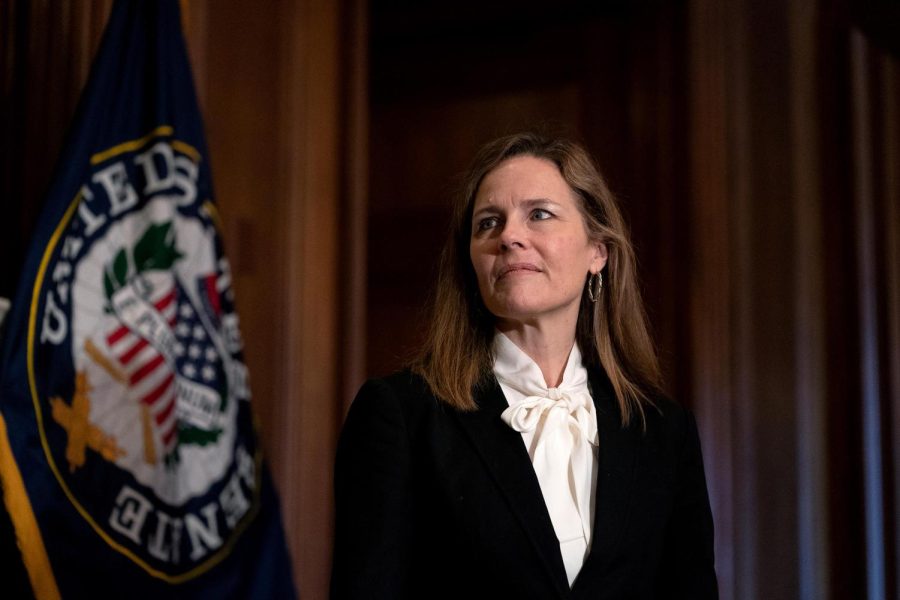 Judge Amy Coney Barrett, President Donald Trump's nominee for the US Supreme Court, meets with Republican Sen. John Hoeven, on Capitol Hill in Washington, on Oct. 1, 2020.