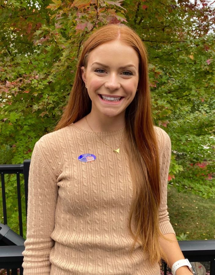 Leah Eberts poses with her “I Voted” sticker on Oct. 11, 2020. 