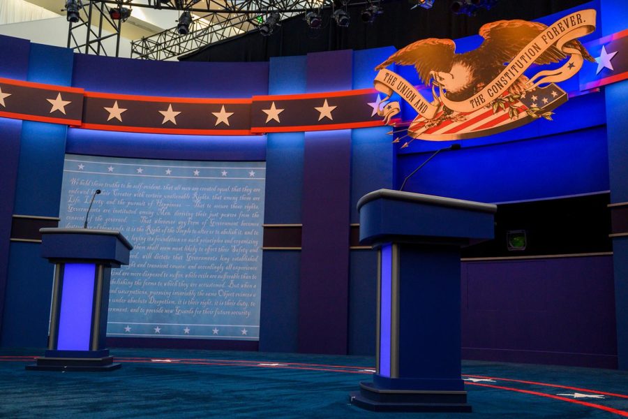 The empty stage of the first US Presidential debate is seen as workers complete the final touches on September 29,2020 in Cleveland, Ohio. - Tuesdays clash in Cleveland, Ohio, the first of three 90-minute debates, represents the first time voters will have the chance to see the candidates facing off against one another directly.