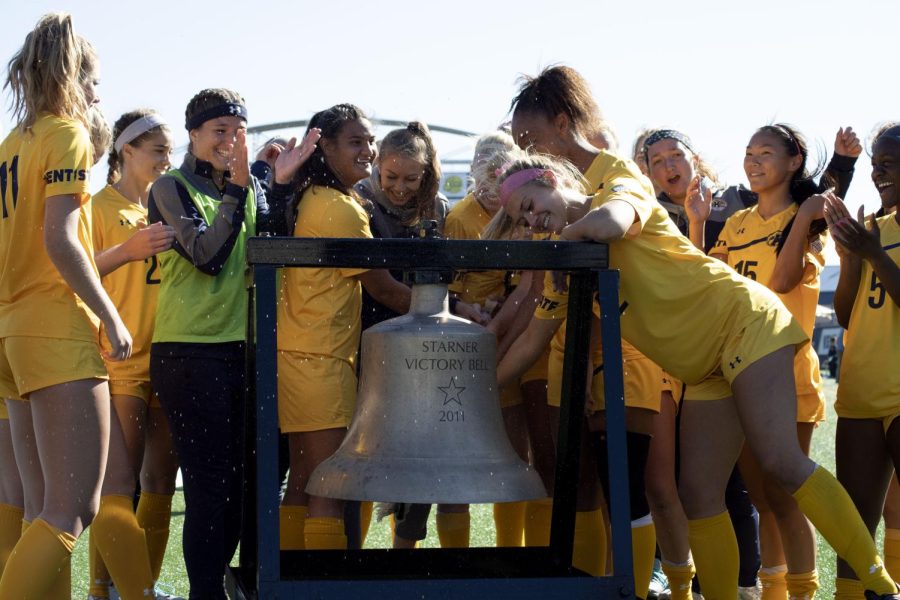 Then Kent State women’s soccer team celebrate their 2-0 win over University of Akron by ringing the Starner Victory Bell on Oct. 13, 2019.