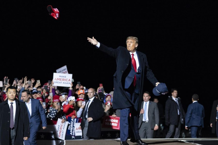 President+Donald+Trump+tosses+a+hat+to+supporters+as+he+arrives+to+speak+at+a+campaign+rally+at+Duluth+International+Airport%2C+Wednesday%2C+Sept.+30%2C+2020%2C+in+Duluth%2C+Minn.+%28AP+Photo%2FAlex+Brandon%29