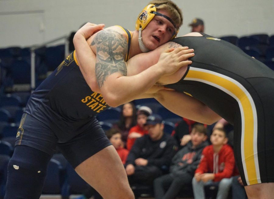 Sophomore Spencer Berthold grapples with Missouris Jacob Bohlken in the heavyweight division at the M.A.C.C. Sunday, Jan. 19, 2020. Berthold fought back at the end of the final period to force overtime, but was unable to get the victory. 