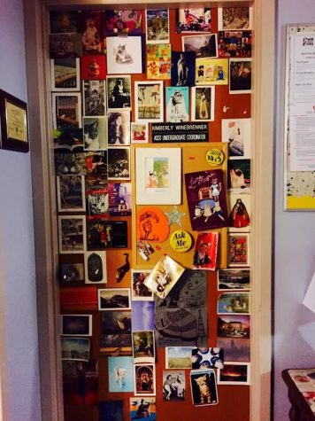 Winebrenner’s door was covered with cat postcards sent by her students and colleagues.