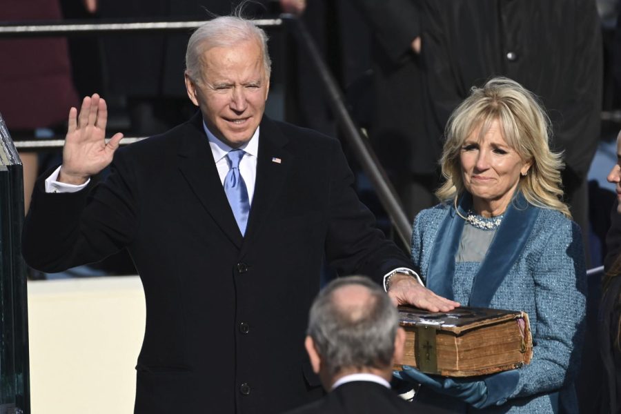 Joe+Biden+is+sworn+in+as+the+46th+president+of+the+United+States+by+Chief+Justice+John+Roberts+as+Jill+Biden+holds+the+Bible+during+the+59th+Presidential+Inauguration+at+the+U.S.+Capitol+in+Washington%2C+Wednesday%2C+Jan.+20%2C+2021.