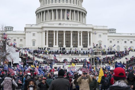 Trump supporters gather outside the Capitol, Wednesday, Jan. 6, 2021, in Washington. As Congress prepares to affirm President-elect Joe Bidens victory, thousands of people have gathered to show their support for President Donald Trump and his claims of election fraud. (AP Photo/Jose Luis Magana)