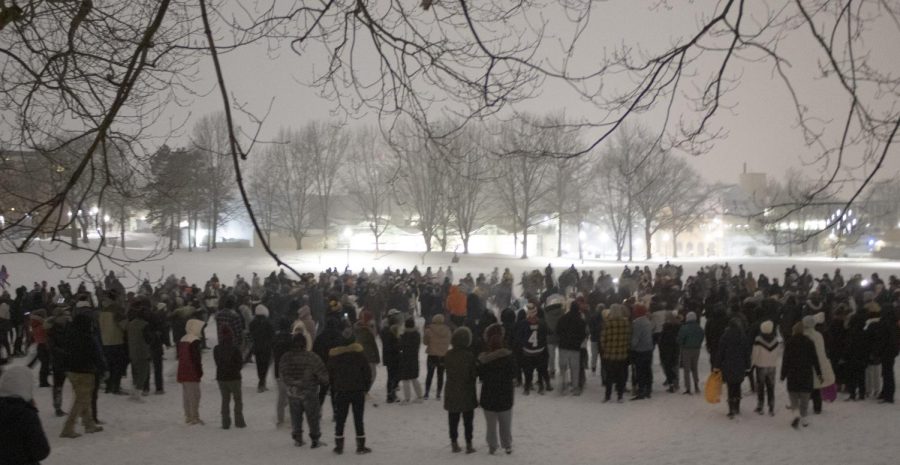 300 to 500 people gather at the hill behind Taylor Hall on Mon. Feb. 15 to engage in a snowball fight. Other items were thrown such as laundry baskets, Xbox controllers and potatoes.