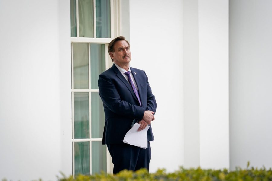 WASHINGTON, DC - JANUARY 15: MyPillow CEO Mike Lindell waits outside the West Wing of the White House before entering on January 15, 2021 in Washington, DC. 