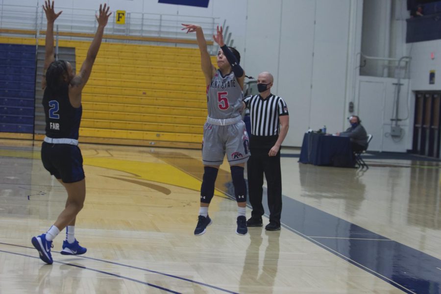 Mariah Modkins (5) loses a three against the University at Buffalo. Modkins scored seven points in the fourth quarter to lead a game-winning rally. Feb. 24, 2021.