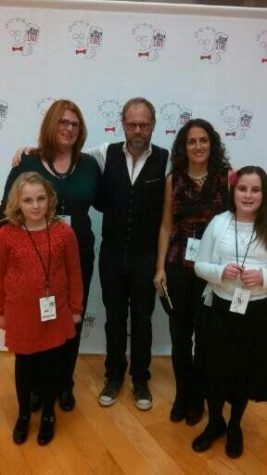 Meaghan Chismar (left), a community member near Kent State’s Tuscarawas campus, stands next to Food Network’s Alton Brown (middle) and her friend (right) at an event held at the Tuscarawas Performing Arts Center in 2014.  