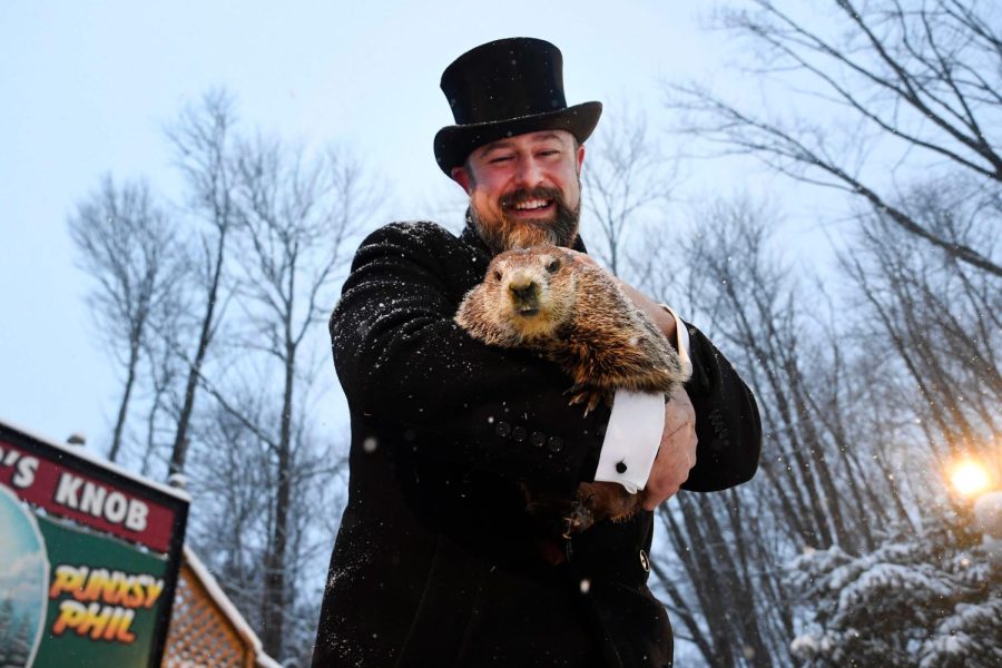 Groundhog+Club+handler+A.J.+Dereume+holds+Punxsutawney+Phil%2C+the+weather+prognosticating+groundhog%2C+during+the+135th+celebration+of+Groundhog+Day+on+Gobblers+Knob+in+Punxsutawney%2C+Pa.+Tuesday%2C+Feb.+2%2C+2021.+Phils+handlers+said+that+the+groundhog+has+forecast+six+more+weeks+of+winter+weather+during+this+years+event+that+was+held+without+anyone+in+attendance+due+to+potential+COVID-19+risks.%C2%A0
