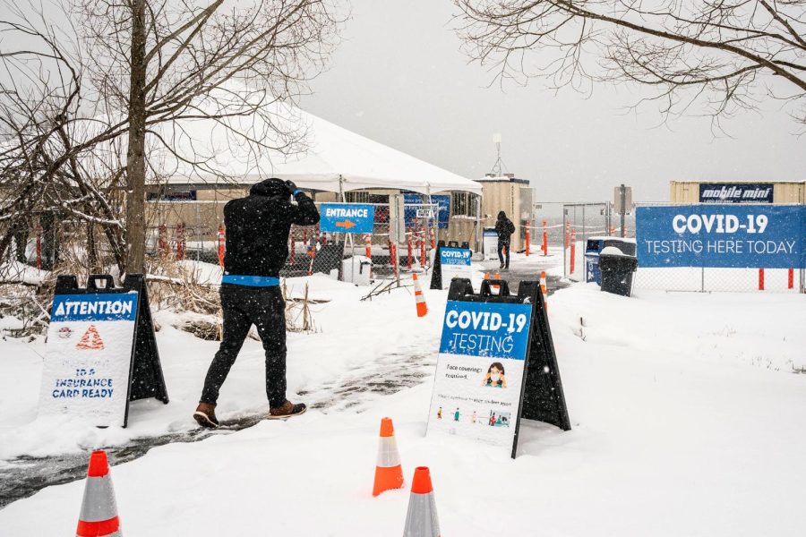 People enter a Covid-19 testing site Saturday in Seattle, Washington.