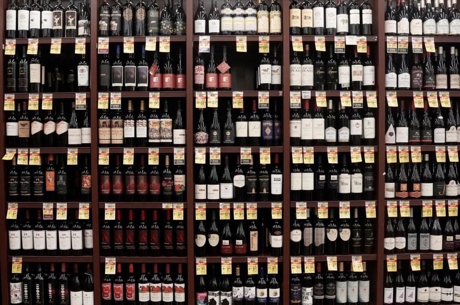Bottles+of+red+wine+are+displayed+for+sale+inside+Albertsons+Cos.+grocery+store+in+San+Diego%2C+California%2C+U.S.+on+Monday%2C+June+22%2C+2020.+Existing+shareholders+of+Albertsons+Cos.%2C+including+Cerberus+Capital+Management%2C+are+seeking+as+much+as+%241.3+billion+in+its+U.S.+initial+public+offering%2C+as+grocery+remains+of+the+the+few+businesses+to+get+a+boost+from+the+pandemic.%C2%A0