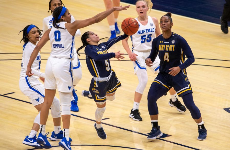 Junior Mariah Modkins (5) takes a layup in Kent State's 73-66 loss to Buffalo in the MAC tournament. March 10, 2021.