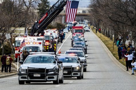 BOULDER, CO - MARCH 24: Law enforcement vehicles escort the body of slain Boulder Police officer Eric Talley to a funeral home on March 24, 2021 in Boulder, Colorado. Ten people, including Talley, were killed in a shooting at a King Soopers grocery store on Monday. (Photo by Michael Ciaglo/Getty Images)