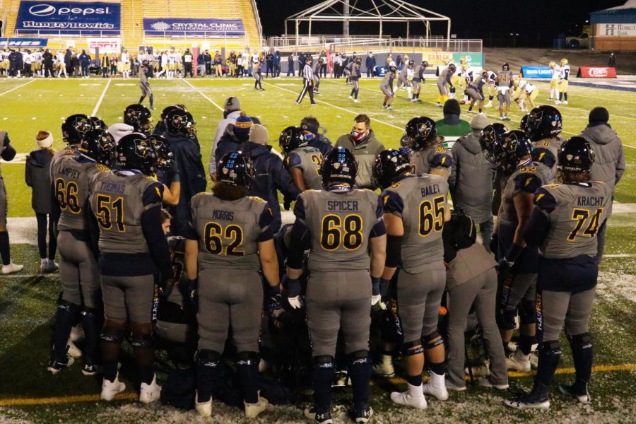 Kent State’s offensive line huddles to strategize during their game against Akron. Nov. 17, 2020.