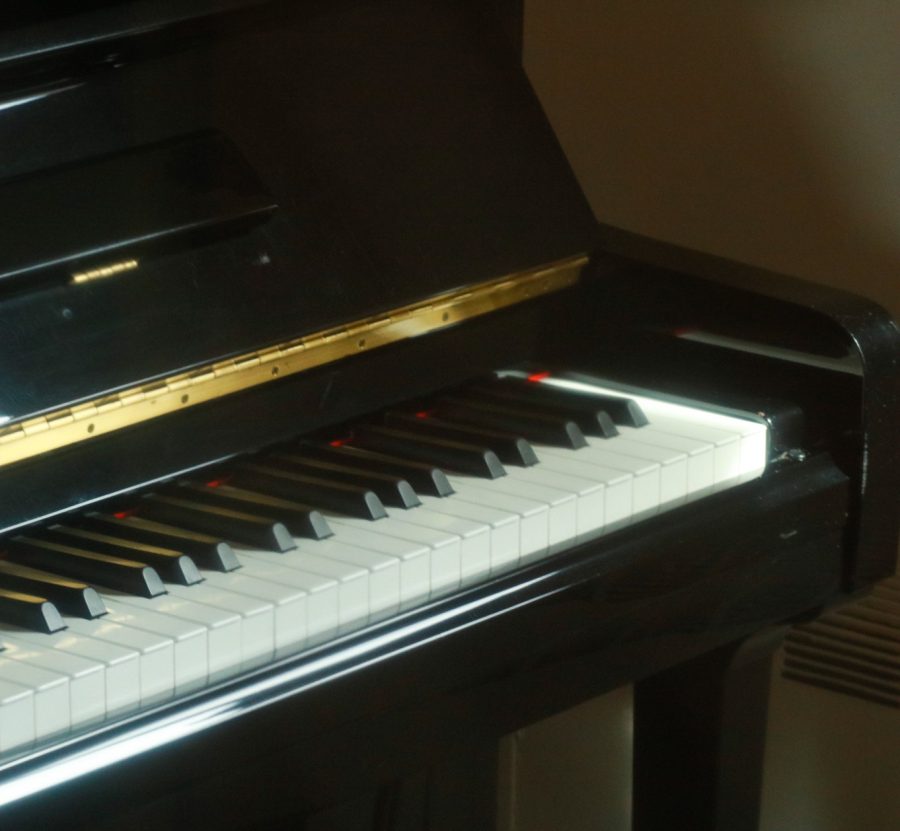A close-up of a piano in a practice room in the CPA (Center for Performing Arts). 