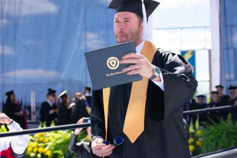 Julian Edelman, wide receiver for the New England Patriots, with the integrative studies degree he received at Kent State’s One University Commencement held May 11, 2019 at Dix Stadium.