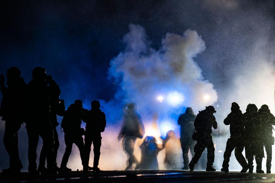 Authorities+fire+gas+munitions+at+demonstrators+gathered+outside+the+Brooklyn+Center+Police+Department+to+protest+the+shooting+death+of+Daunte+Wright%2C+late+Tuesday%2C+April+13%2C+2021%2C+in+Brooklyn+Center%2C+Minn.+%28AP+Photo%2FJohn+Minchillo%29