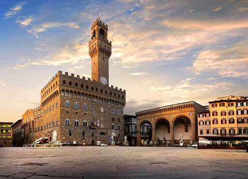 Palazzo Vecchio, the town hall of Florence, sits right outside the heart of the city adjacent to the Arno River.