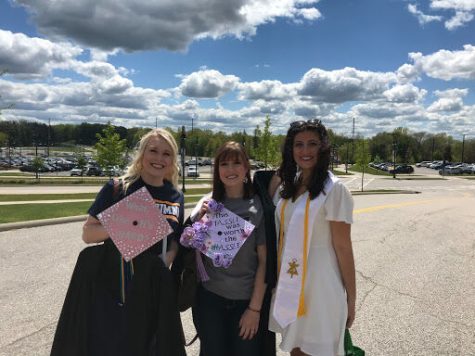 (Left to Right) Graduates Mackenzie McGary, Shayna McGary and Maria Frissora pose as they prepare to for the College of Aeronautics and Engineering and College of Education, Health and Humanities commencement ceremony Thursday.