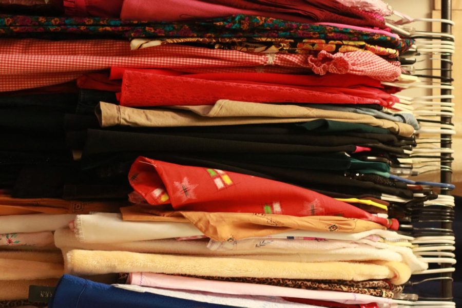 Colorful clothing hangs on the racks at Einsteins Attic. 