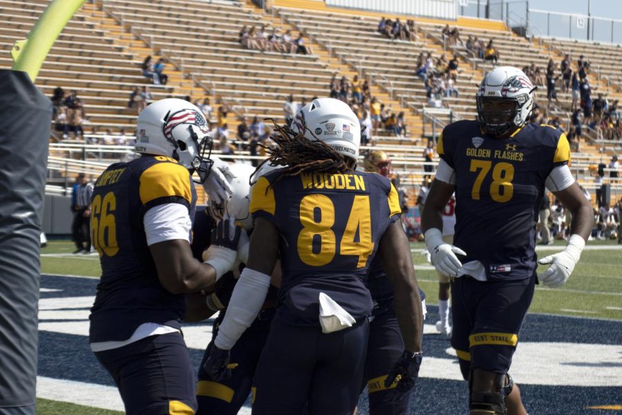 Memebrs of the Kent State University football team celebrate a touchdown in the game agaisnt Virginia Military Institute on Sept. 11, 2021.