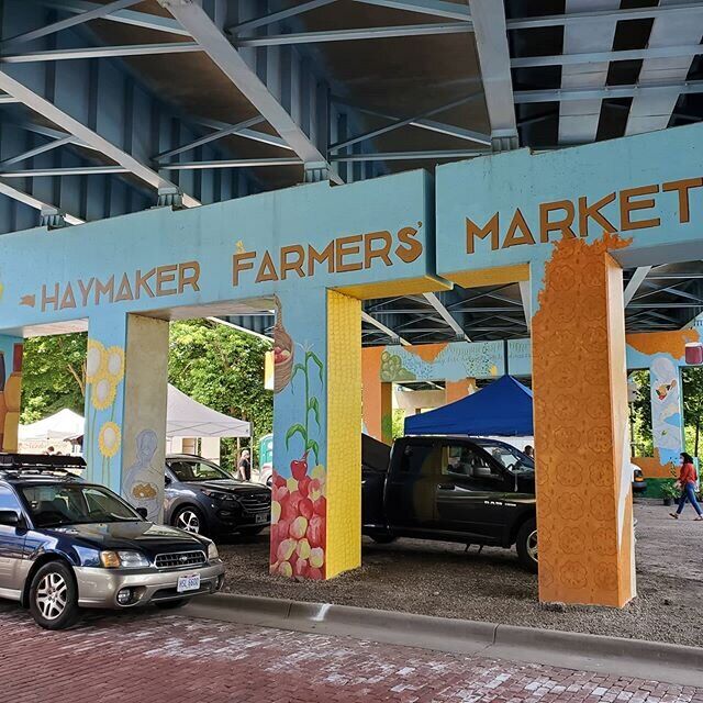 Art that doubles as a sign for Haymaker Farmers Market Website.