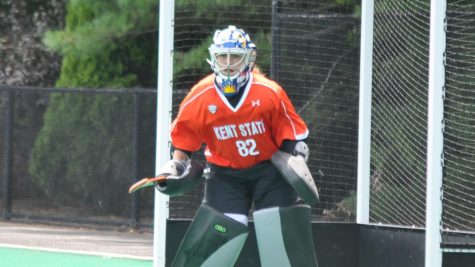 Field hockey goalie Azure Fernsler stands ready in the goal during a Kent State game. 