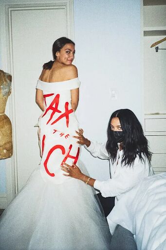AOC and the designer of the dress, Aurora James, getting ready before the Met Gala. 