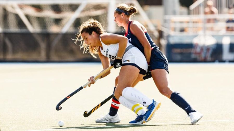 Senior midfielder Helena Cambra Soler makes a move on the ball during the Kent State field hockeys 2-1 loss to Liberty University on Sunday Oct. 24 in Lynchburgh, Virginia. 