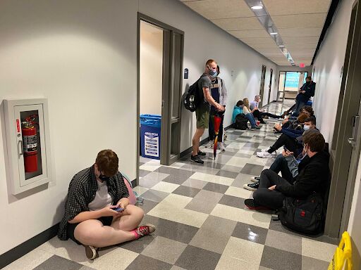 Students take shelter in the basement of Franklin Hall Thursday following a tornado warning issued by the National Weather Service on Thursday, Oct. 21, 2021. 