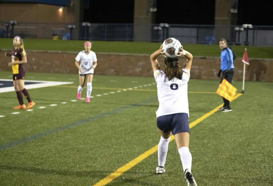 Freshman defender Tori Copfer (6) throws the ball into play during the soccer game on Oct. 21, 2021. Kent State played Central Michigan University and tied 1-1 in double overtime.