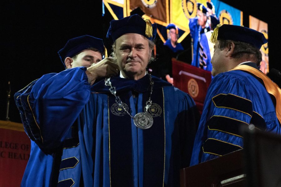 President Todd Diacon (middle) accepts the Presidential Medal from Nicholas Kollar (left) and Ralph M. Della Ratta (right) during the inauguration ceremony on Nov. 1, 2019.