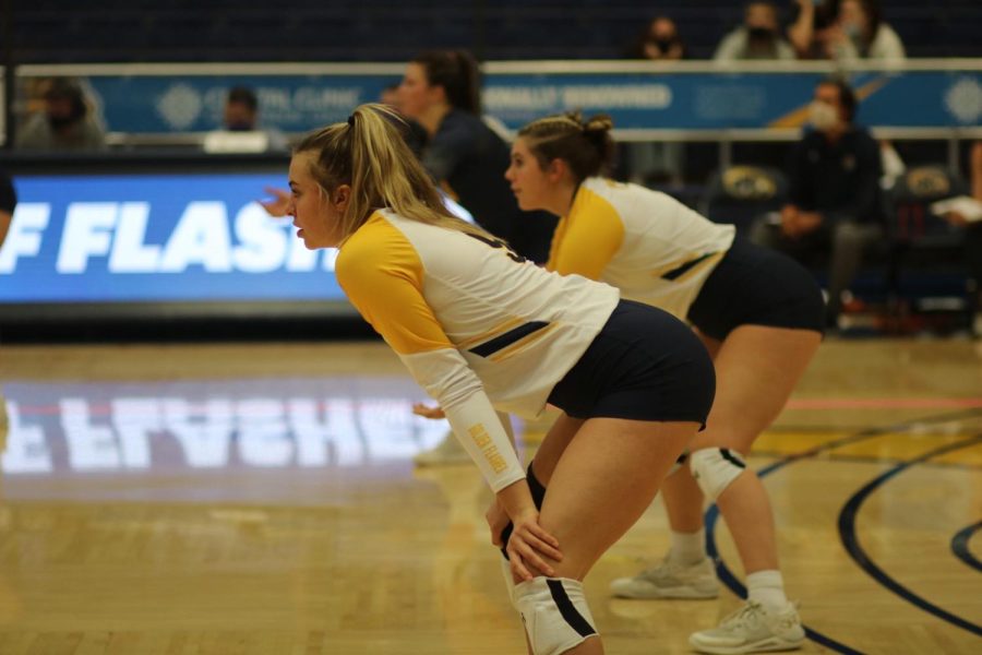 Junior outside hitter Taylor Heberle gets ready to defend against the Buffalo Bulls at the Mac on Saturday, Oct. 23. Photo by Morgan McGrath.