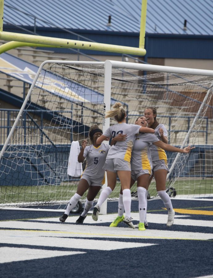 Members of the Kent State Womens soccer team celebrate getting a goal during the soccer game against Bowling Green State University on Oct. 3, 2021. Kent State lost 3-2.