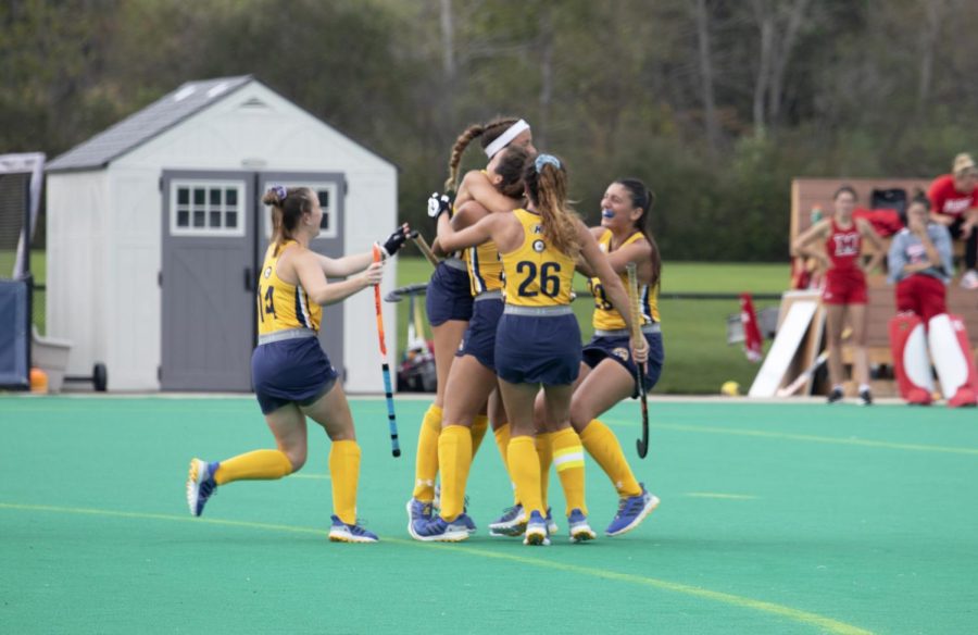 Members+of+the+Kent+State+University+field+hockey+game+celebrate+a+goal+during+the+game+against+Miami+University+on+Oct.+15%2C+2021.+Kent+State+beat+Miami+1-0.