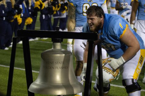 Nathan Monnin rings the bell and continues tradition after Kent States 52-47 win over Northern Illinois on Wednesday night. 